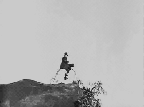 Magical flying penny farthing (GIF)