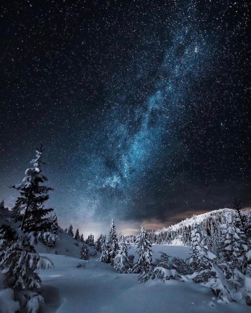 Night sky in the snowy mountains